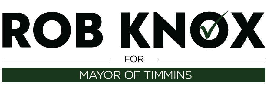 Team Steve Black Un panneau de campagne portant le texte " Rob Knox for Mayor of Timmins " et un crochet vert à l'intérieur de la lettre " O " de " KNOX ". Liberals Canada Politics